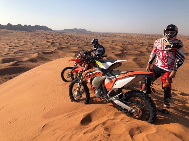 Close-up of fat bike tire gripping Dubai desert sand