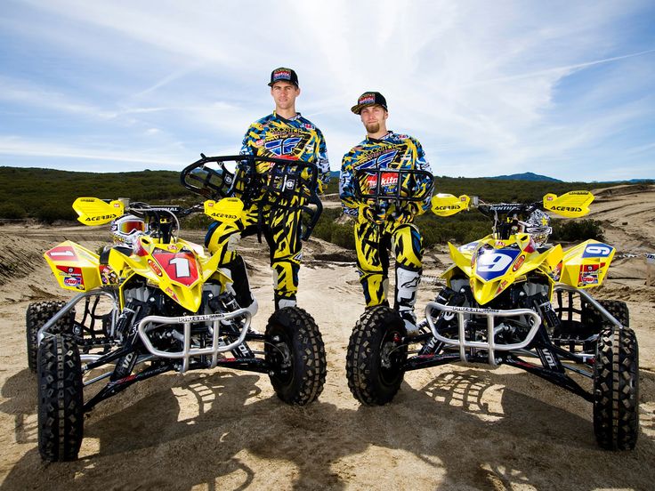 Group enjoying quad bike and ATV tour across Dubai sand dunes