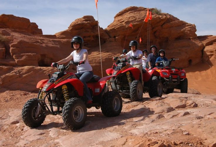 Riding a quad bike over Dubai’s golden dunes